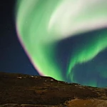 Polar Auroras: Lights of the Solar Wind