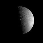 Dione: Saturn's Icy Moon with Buried Secrets and Frozen Landscapes
