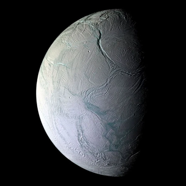Enceladus viewed by Cassini with its vapor plumes