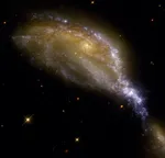 Galaxy Merger NGC 6745: A Traversal of One by the Other
