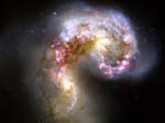 Fusion de galaxies et trous noirs